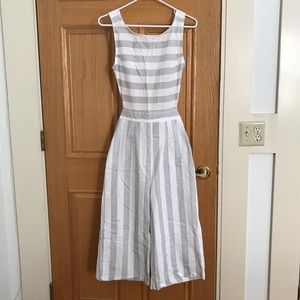 Grey and white striped, open back jumpsuit